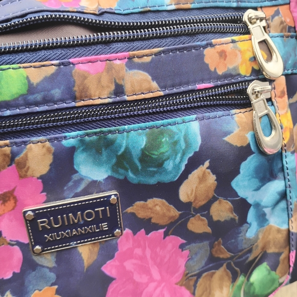 RUIMOTI Floral Crossbody Bag in Navy with Pink & Blue Flowers - Picture 5 of 6